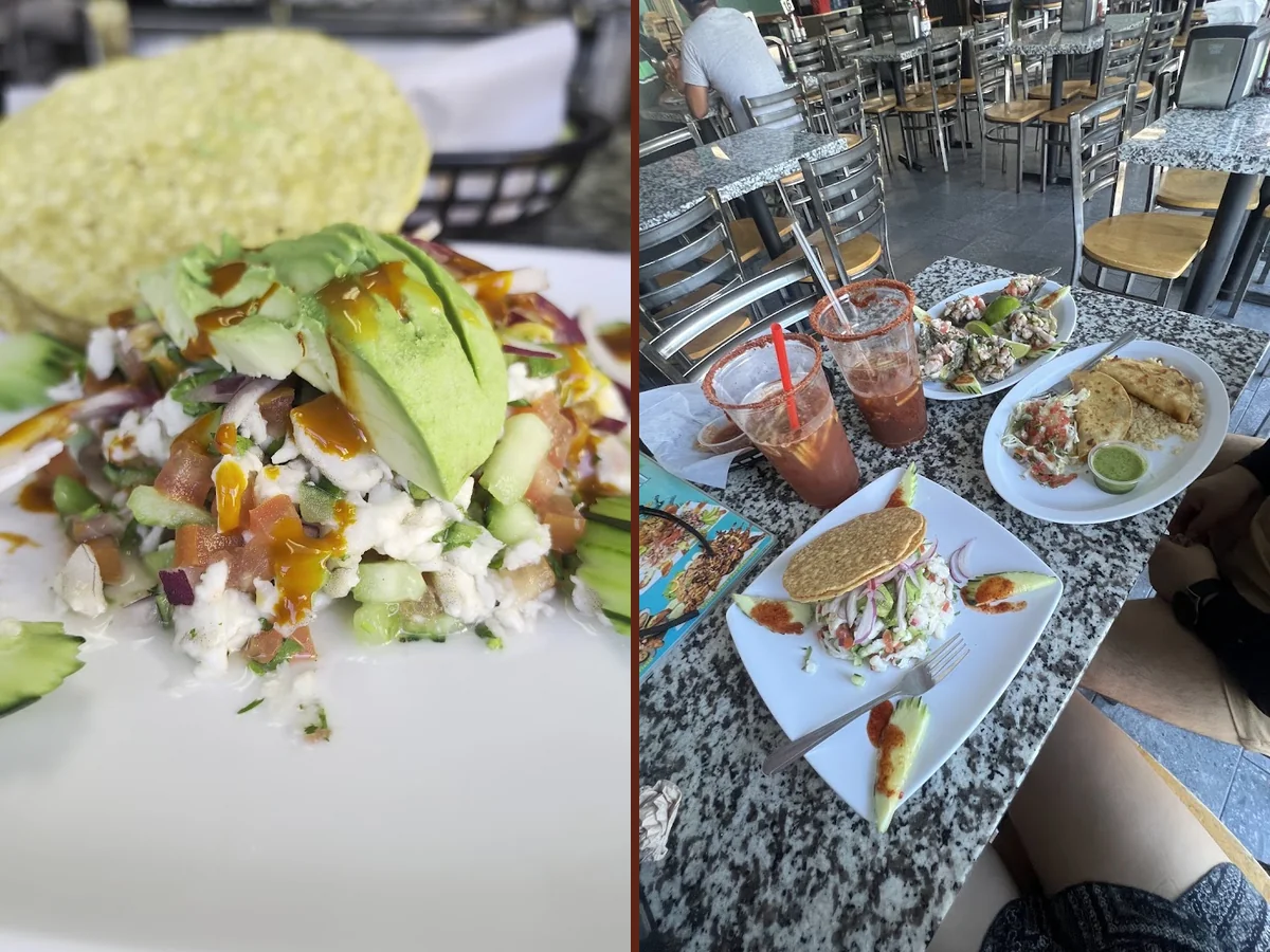 Colorful drinks beside a seafood meal.